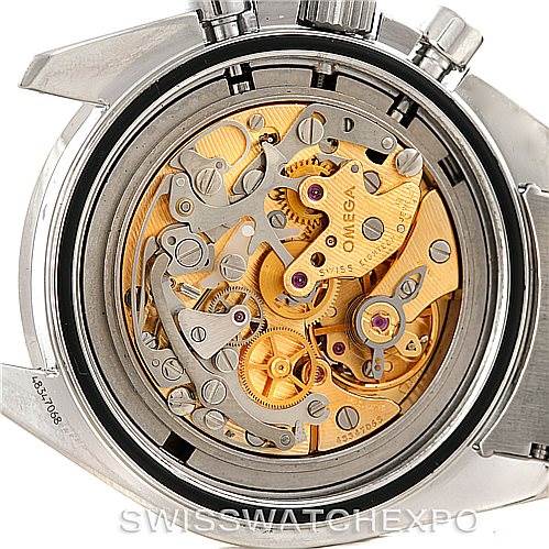 The image shows the back view of an Omega Speedmaster 3570.50.00 Men's Stainless Steel Black Dial 3570.50.00 Men's Stainless Steel Black Dial watch, focusing on its intricate movement and mechanical components.