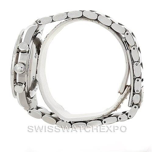 The image shows a side view of an Omega Speedmaster 3529.50.00 Men
s Stainless Steel Black Dial 3529.50.00 Men
s Stainless Steel Black Dial watch, highlighting its case, crown, and metal bracelet.