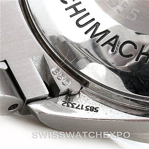 The image shows the back case and part of the clasp of an Omega Speedmaster 3529.50.00 Men
s Stainless Steel Black Dial 3529.50.00 Men
s Stainless Steel Black Dial, highlighting the model engraving and serial number.