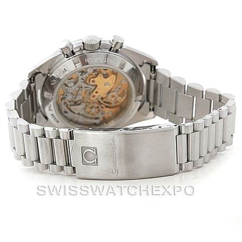 The image shows the back view of an Omega Speedmaster 3592.50.00 Men
s Stainless Steel Black Dial 3592.50.00 Men
s Stainless Steel Black Dial watch, highlighting the clasp and the transparent case back revealing the movement.