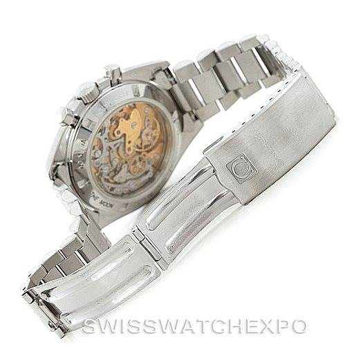 The image shows the back and clasp of an Omega Speedmaster 3592.50.00 Men
s Stainless Steel Black Dial 3592.50.00 Men
s Stainless Steel Black Dial watch, highlighting the transparent case back and the bracelet.