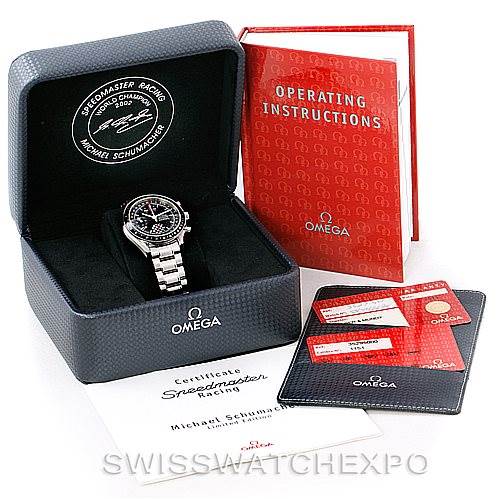 The image shows an Omega Speedmaster 3529.50.00 Men
s Stainless Steel Black Dial 3529.50.00 Men
s Stainless Steel Black Dial watch in its box, with operating instructions, warranty cards, and a certificate displayed.
