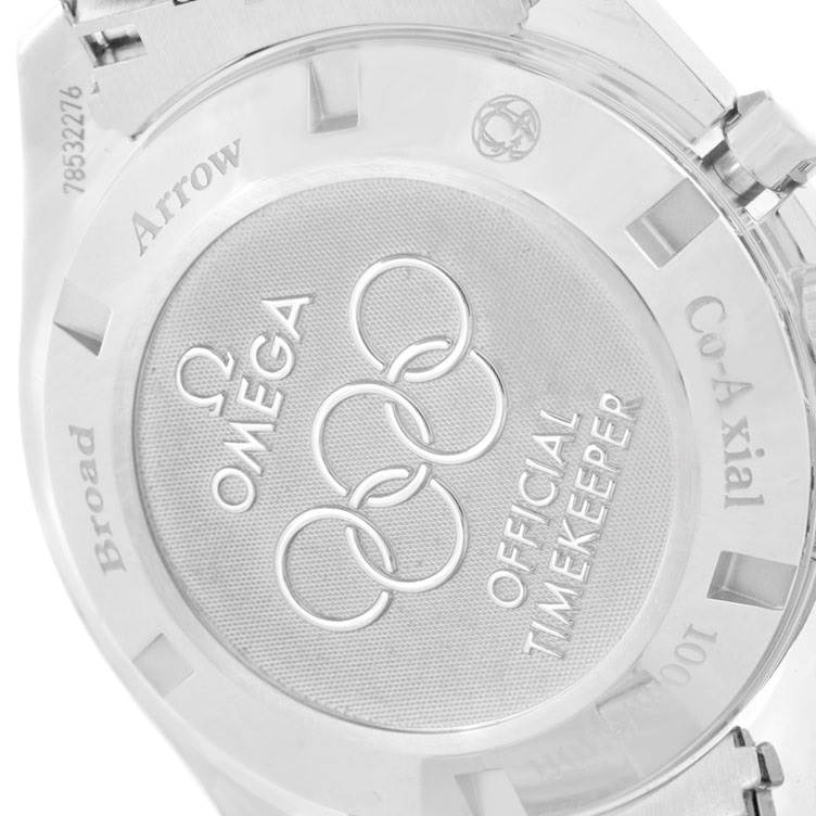 This image shows the case back of an Omega Speedmaster 321.10.42.50.04.001 Men
s Stainless Steel White Dial 321.10.42.50.04.001 Men
s Stainless Steel White Dial watch with Olympic branding and various engravings.