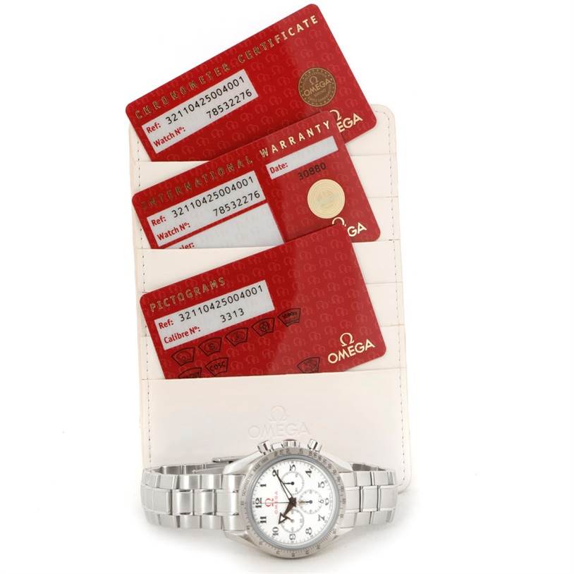 The image shows an Omega Speedmaster 321.10.42.50.04.001 Men
s Stainless Steel White Dial 321.10.42.50.04.001 Men
s Stainless Steel White Dial watch and its accompanying chronometer certificate, warranty card, and pictograms card.