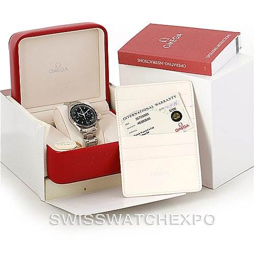 The image shows an Omega Speedmaster 3572.50.00 Men
s Stainless Steel Black Dial 3572.50.00 Men
s Stainless Steel Black Dial watch, its box, warranty card, and operating instructions.