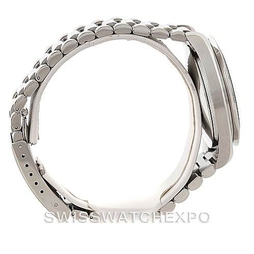 The image shows a side view of an Omega Speedmaster 3510.50.00 Men
s Stainless Steel Black Dial 3510.50.00 Men
s Stainless Steel Black Dial watch, displaying its bracelet and case.