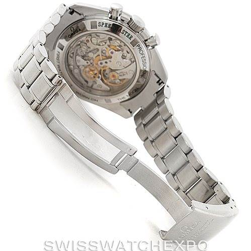 The image shows the Omega Speedmaster 3572.50.00 Men
s Stainless Steel Black Dial 3572.50.00 Men
s Stainless Steel Black Dial watch from an angled view, focusing on the open clasp, bracelet, and transparent case back.