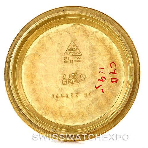 This image shows the inside case back of an Omega Speedmaster 145022 Men's Yellow Gold Champagne Dial 145022 Men's Yellow Gold Champagne Dial watch, highlighting brand markings and a serial number.