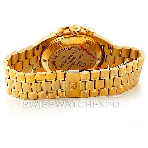 The image shows the back case and bracelet of the Omega Speedmaster 145022 Men's Yellow Gold Champagne Dial 145022 Men's Yellow Gold Champagne Dial watch in gold, showcasing its closed clasp and inscribed case back.