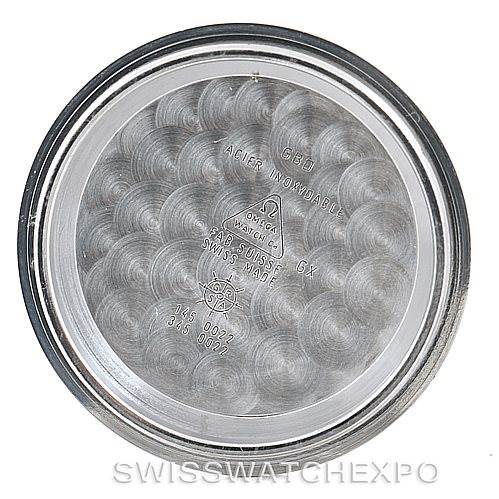 This image shows the interior case back of an Omega Speedmaster Men
s Stainless Steel Black Dial Men
s Stainless Steel Black Dial watch, displaying its engravings and markings.