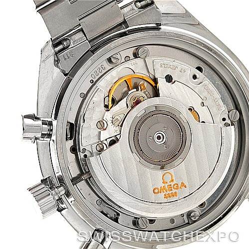 The image shows the back of an Omega Speedmaster 3510.50.00 Men
s Stainless Steel Black Dial 3510.50.00 Men
s Stainless Steel Black Dial watch, revealing its movement and internal mechanisms.