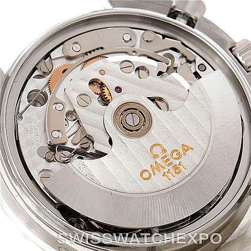 The image shows the movement and internal mechanism of the Omega Speedmaster 3520.50.00 Men
s Stainless Steel Black Dial 3520.50.00 Men
s Stainless Steel Black Dial watch at a close-up angle.