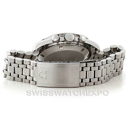 This image shows the Omega Speedmaster Men
s Stainless Steel Black Dial Men
s Stainless Steel Black Dial watch laying on its side, highlighting the stainless steel bracelet, clasp, and the side profile of the case and crown.