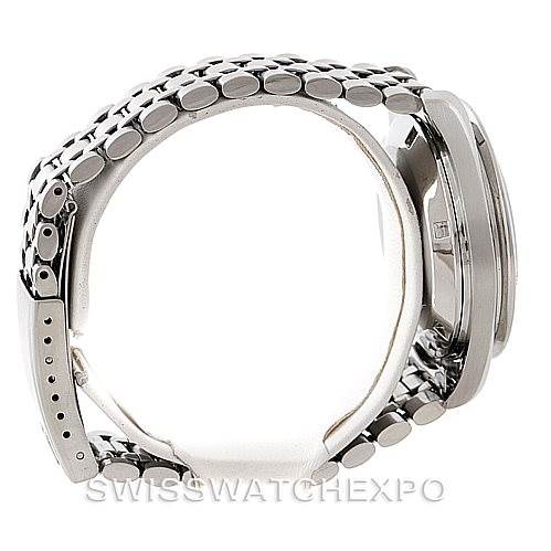 This image shows a side view of the Omega Speedmaster Men
s Stainless Steel Black Dial Men
s Stainless Steel Black Dial, highlighting its metal bracelet and case.