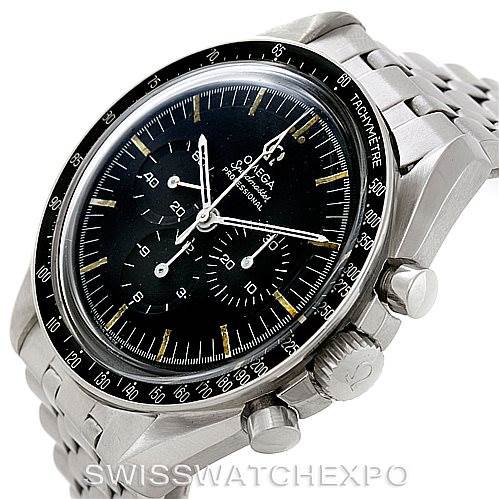 The image shows a close-up of an Omega Speedmaster Men
s Stainless Steel Black Dial Men
s Stainless Steel Black Dial watch, highlighting the face, bezel, and side pushers.