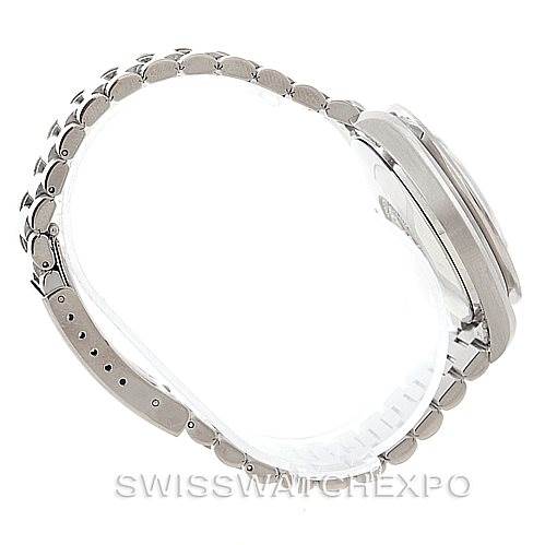 The image shows a side view of an Omega Speedmaster 3510.50.00 Men
s Stainless Steel Black Dial 3510.50.00 Men
s Stainless Steel Black Dial watch, focusing on the case and bracelet.