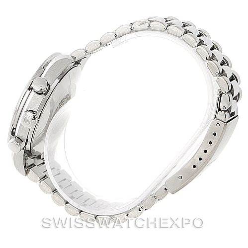 The image shows a side view of the Omega Speedmaster 3510.50.00 Men
s Stainless Steel Black Dial 3510.50.00 Men
s Stainless Steel Black Dial watch, highlighting the stainless steel bracelet and adjustment holes.