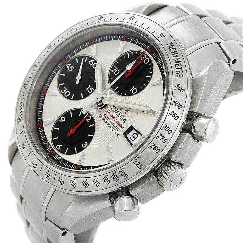 The image shows an angled view of the Omega Speedmaster 3211.31.00 Men
s Stainless Steel Silver Dial 3211.31.00 Men
s Stainless Steel Silver Dial watch, highlighting the dial, subdials, bezel, crown, and pushers.