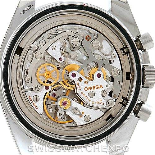 The image shows the case back of an Omega Speedmaster 3570.50.00 Men
s Stainless Steel Black Dial 3570.50.00 Men
s Stainless Steel Black Dial watch, revealing the intricate mechanics of its movement.