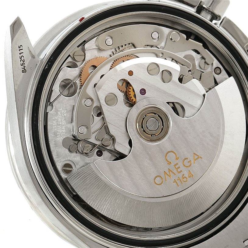 This image shows the Omega Speedmaster 3210.51.00 Men
s Stainless Steel Black Dial 3210.51.00 Men
s Stainless Steel Black Dial
s internal mechanism from a top-down view, highlighting the movement and gears.