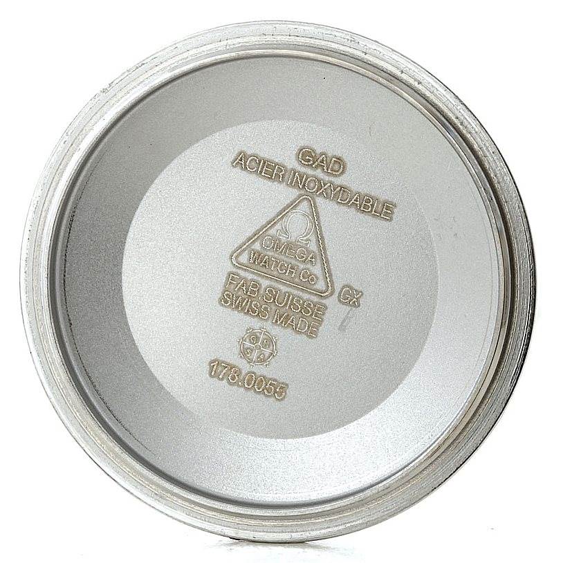 This image shows the interior case back of an Omega Speedmaster 3210.51.00 Men
s Stainless Steel Black Dial 3210.51.00 Men
s Stainless Steel Black Dial watch, displaying model details and manufacturer information.