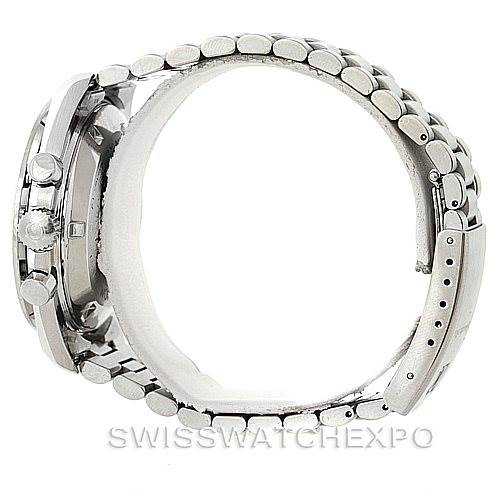 This image shows a side view of the Omega Speedmaster Men
s Stainless Steel Black Dial Men
s Stainless Steel Black Dial watch, highlighting its stainless steel case and bracelet.