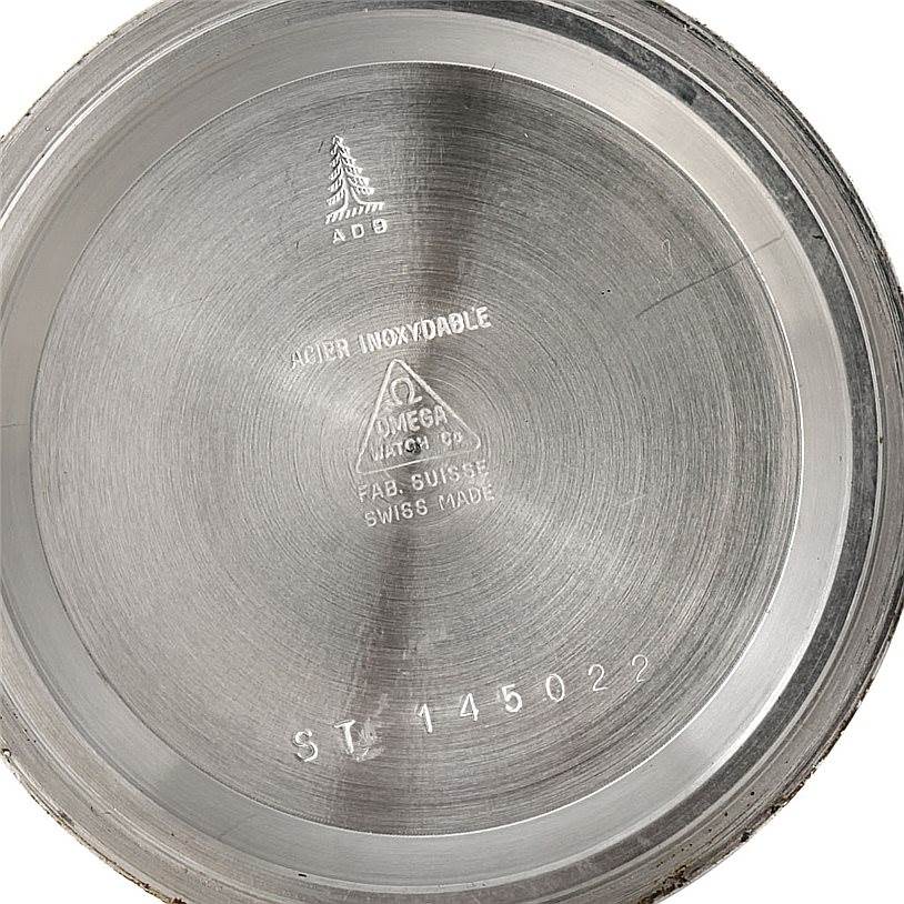 The image shows the inside case back of an Omega Speedmaster Men
s Stainless Steel Black Dial Men
s Stainless Steel Black Dial watch with model number ST 145022.