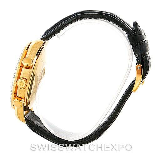 This image shows a side profile of the Omega Speedmaster 3621.80.00 Men's Yellow Gold Blue Dial 3621.80.00 Men's Yellow Gold Blue Dial watch, highlighting its gold case, push buttons, and black leather strap.