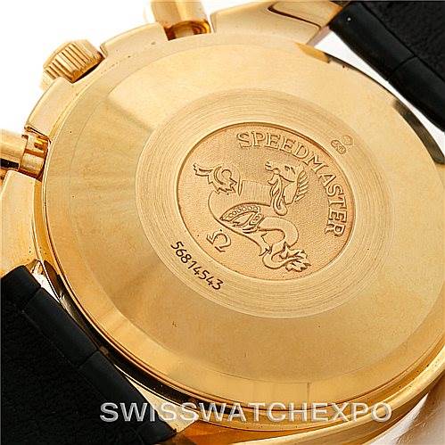 The image shows the back case of an Omega Speedmaster 3621.80.00 Men's Yellow Gold Blue Dial 3621.80.00 Men's Yellow Gold Blue Dial watch with engraved detailing and serial number.