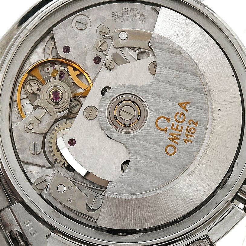 The image shows the inner mechanism and movement of an Omega Speedmaster 3513.80.00 Men
s Stainless Steel Blue Dial 3513.80.00 Men
s Stainless Steel Blue Dial watch, including gears and the rotor.