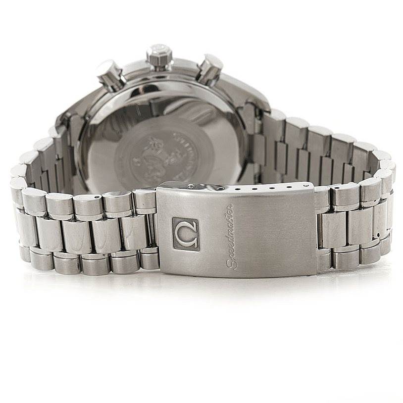 This image shows the backside and clasp of an Omega Speedmaster 3513.80.00 Men
s Stainless Steel Blue Dial 3513.80.00 Men
s Stainless Steel Blue Dial watch, highlighting its stainless steel bracelet and engraved logo.