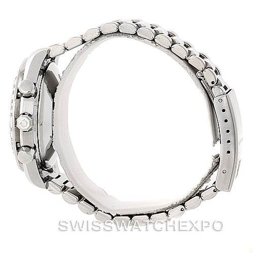 The image shows a side profile of an Omega Speedmaster 3513.80.00 Men
s Stainless Steel Blue Dial 3513.80.00 Men
s Stainless Steel Blue Dial model, highlighting its case, crown, buttons, and bracelet.