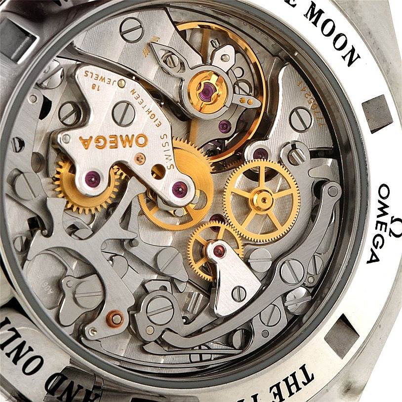 This image of the Omega Speedmaster 3576.50.00 Men
s Stainless Steel Black Dial 3576.50.00 Men
s Stainless Steel Black Dial watch displays its intricate internal mechanism from a close-up, rear angle.