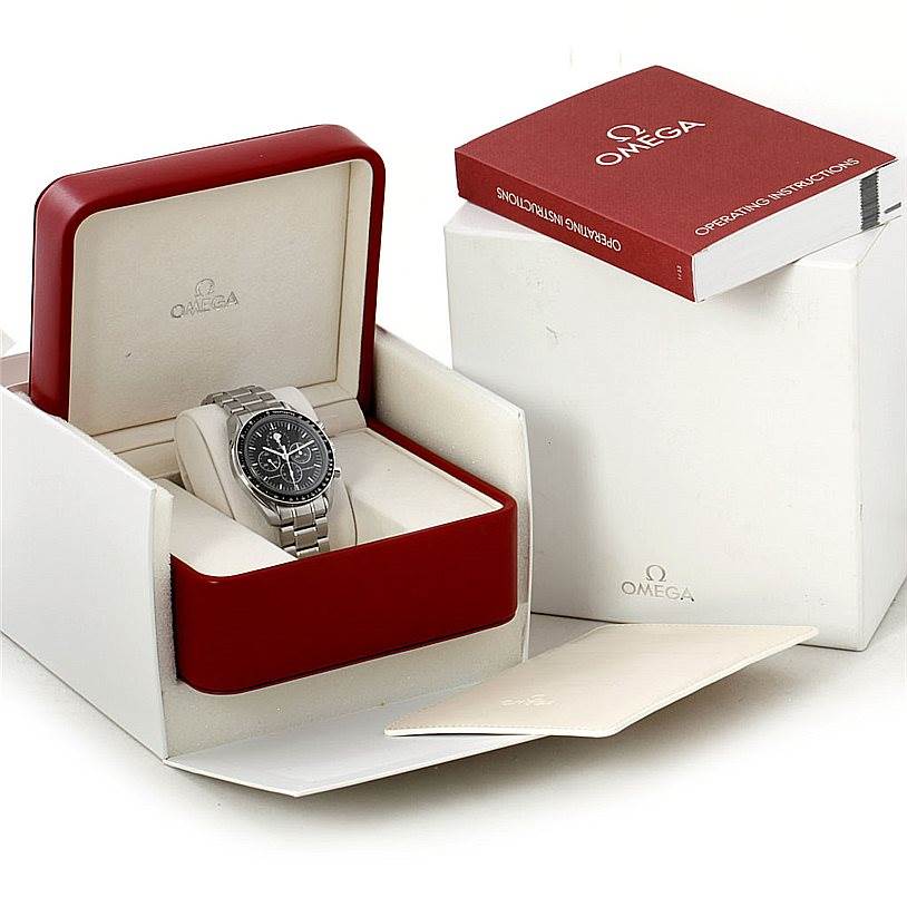 The Omega Speedmaster 3576.50.00 Men
s Stainless Steel Black Dial 3576.50.00 Men
s Stainless Steel Black Dial watch is shown in an open red and white box with a red Omega instruction booklet and outer packaging.