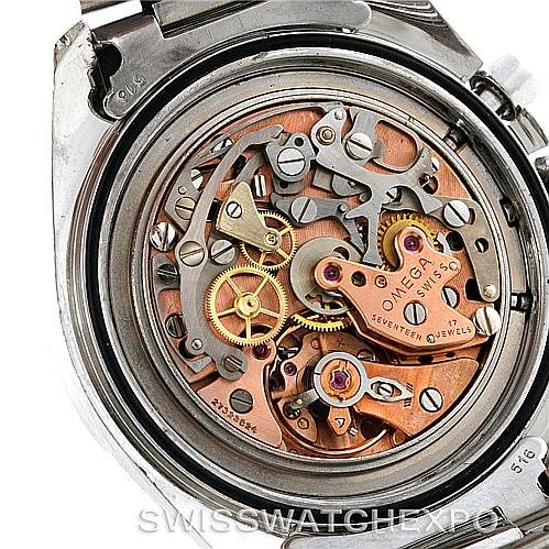 This is an image showing the intricate inner mechanisms and movement of an Omega Speedmaster Men
s Stainless Steel Black Dial Men
s Stainless Steel Black Dial watch.