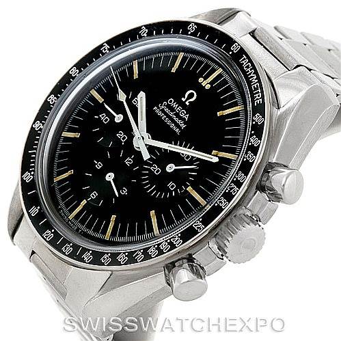 The image shows an angled view of an Omega Speedmaster Men
s Stainless Steel Black Dial Men
s Stainless Steel Black Dial, highlighting the dial, bezel, and pushers.