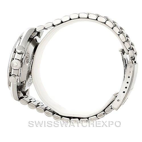 The image shows a side profile of the Omega Speedmaster Men
s Stainless Steel Black Dial Men
s Stainless Steel Black Dial watch, highlighting its case, crown, pushers, and metal bracelet.