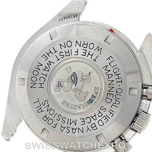 The image shows the back case of an Omega Speedmaster Men
s Stainless Steel Black Dial Men
s Stainless Steel Black Dial watch with inscriptions and partial lugs visible.