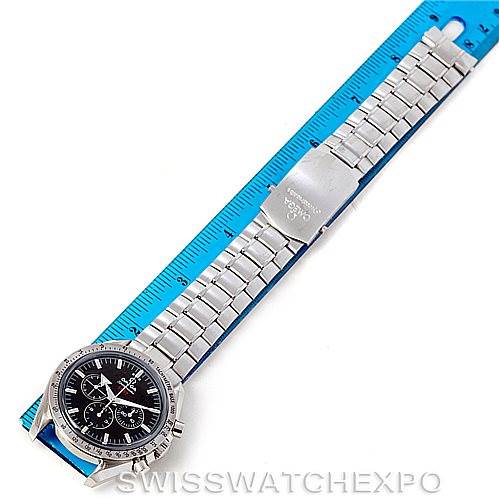 This image shows the Omega Speedmaster 321.10.42.50.01.001 Men
s Stainless Steel Black Dial 321.10.42.50.01.001 Men
s Stainless Steel Black Dial watch laid flat on a blue ruler, displaying its face and metal bracelet.