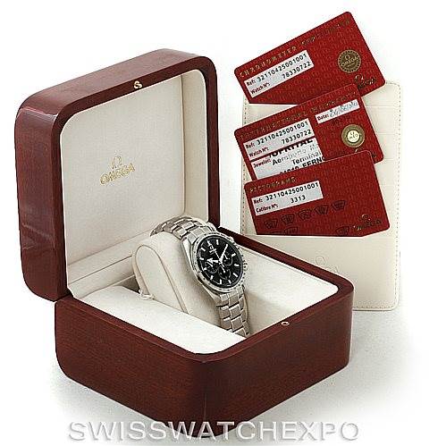The image shows an Omega Speedmaster 321.10.42.50.01.001 Men
s Stainless Steel Black Dial 321.10.42.50.01.001 Men
s Stainless Steel Black Dial watch in an open box with warranty and Best Quality
ation cards displayed beside it.