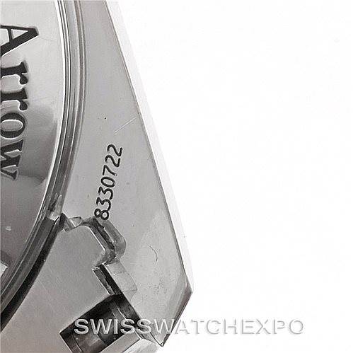 This image shows a close-up of the case back and part of the bracelet attachment of an Omega Speedmaster 321.10.42.50.01.001 Men
s Stainless Steel Black Dial 321.10.42.50.01.001 Men
s Stainless Steel Black Dial watch.