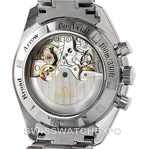 The image shows the back of an Omega Speedmaster 321.10.42.50.01.001 Men
s Stainless Steel Black Dial 321.10.42.50.01.001 Men
s Stainless Steel Black Dial watch, highlighting its mechanical movement and Co-Axial mechanism.