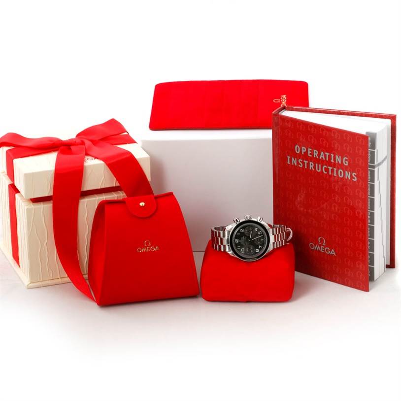 The Omega Speedmaster 324.30.38.40.06.001 Stainless Steel Grey Dial 324.30.38.40.06.001 Stainless Steel Grey Dial watch is displayed with operating instructions, a red case, and a gift box.