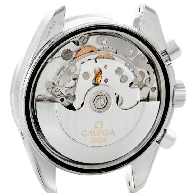 The image shows the back view of an Omega Speedmaster 324.30.38.40.06.001 Stainless Steel Grey Dial 324.30.38.40.06.001 Stainless Steel Grey Dial watch, revealing the internal mechanical movement.
