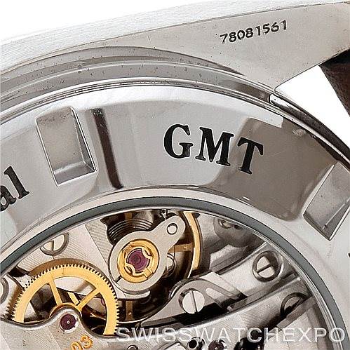 The image shows a close-up view of the Omega Speedmaster 3881.30.37 Men
s Stainless Steel Silver Dial 3881.30.37 Men
s Stainless Steel Silver Dial GMT watch
s movement, focusing on the gears and internal mechanics.