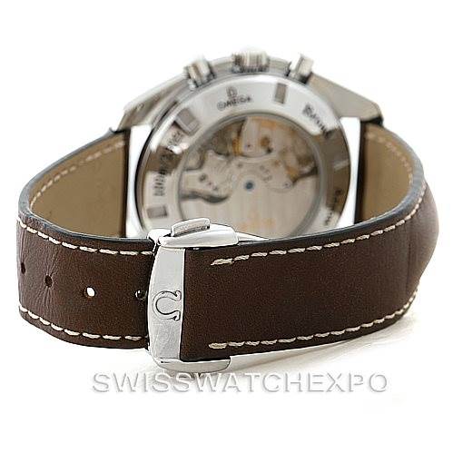 The image shows the back view of an Omega Speedmaster 3881.30.37 Men
s Stainless Steel Silver Dial 3881.30.37 Men
s Stainless Steel Silver Dial watch, focusing on the leather strap and the watch
s transparent case back.