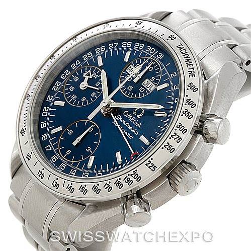 This image shows an angled close-up of the Omega Speedmaster 3523.80.00 Men
s Stainless Steel Blue Dial 3523.80.00 Men
s Stainless Steel Blue Dial watch, highlighting the face, chronograph dials, bezel, and part of the band.