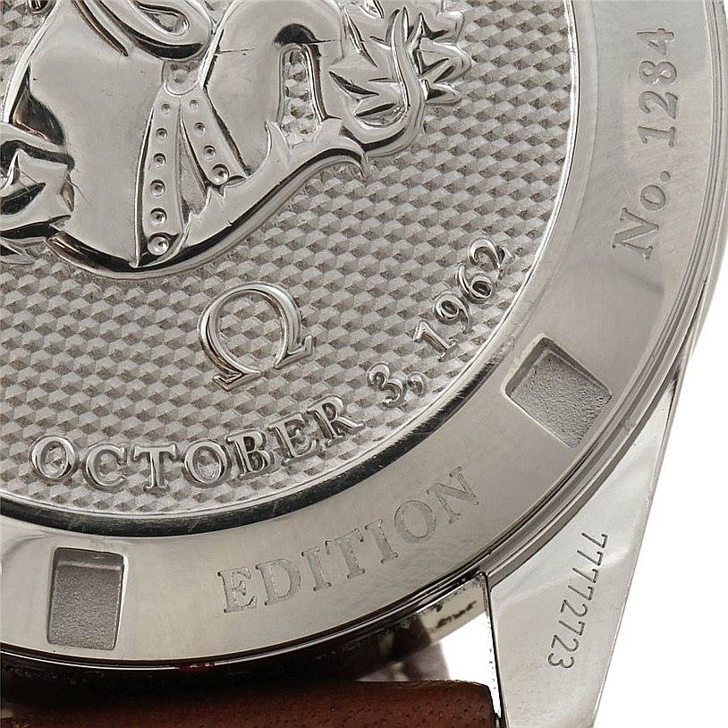 The image shows the case back of the Omega Speedmaster 311.32.40.30.01.001 Men
s Stainless Steel Black Dial 311.32.40.30.01.001 Men
s Stainless Steel Black Dial watch, featuring an engraved design and text.