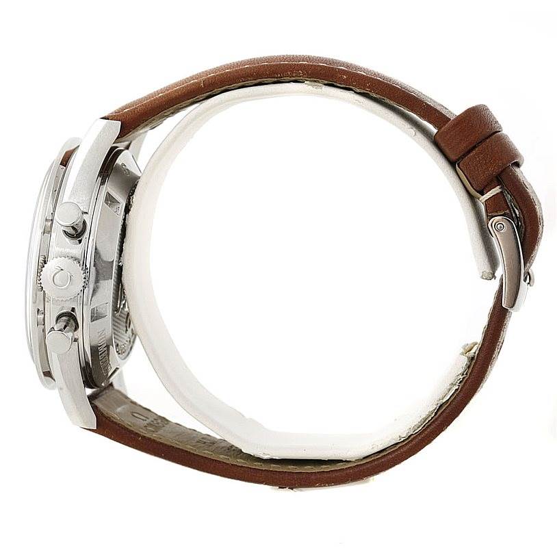 The image shows a side view of the Omega Speedmaster 311.32.40.30.01.001 Men
s Stainless Steel Black Dial 311.32.40.30.01.001 Men
s Stainless Steel Black Dial watch, highlighting the case, pushers, crown, and brown leather strap.