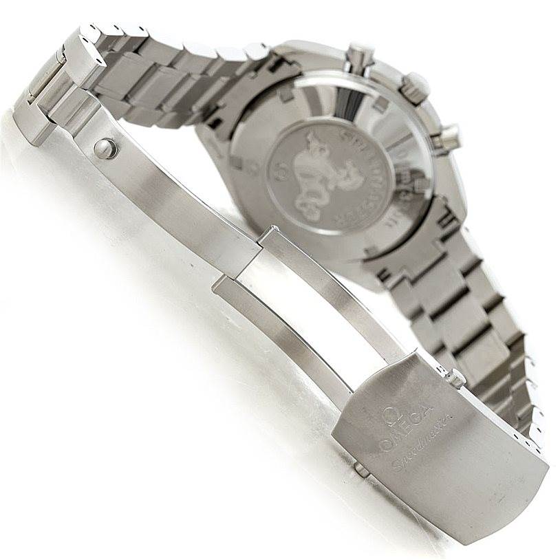 The image shows the clasp and caseback of the Omega Speedmaster 3210.52.00 Men
s Stainless Steel Black Dial 3210.52.00 Men
s Stainless Steel Black Dial watch at an angle.